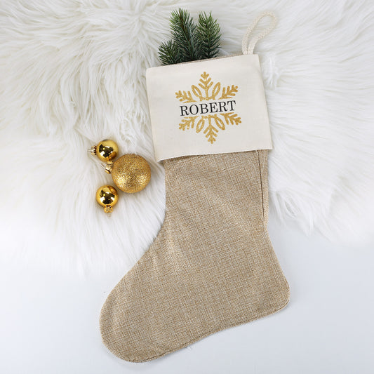 Weihnachtssocke mit goldenem Schneeflockenmotiv und Name bedruckt