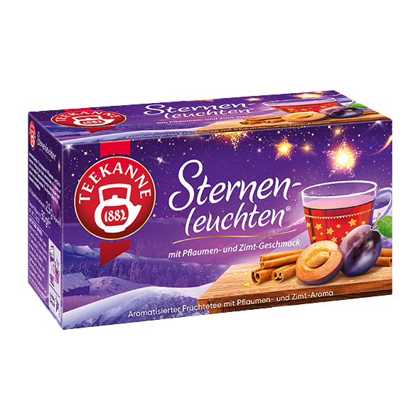 Freigestellte Teepackung „Teekanne Sternenleuchten“ im lila Winterdesign mit Pflaume und Zimt.