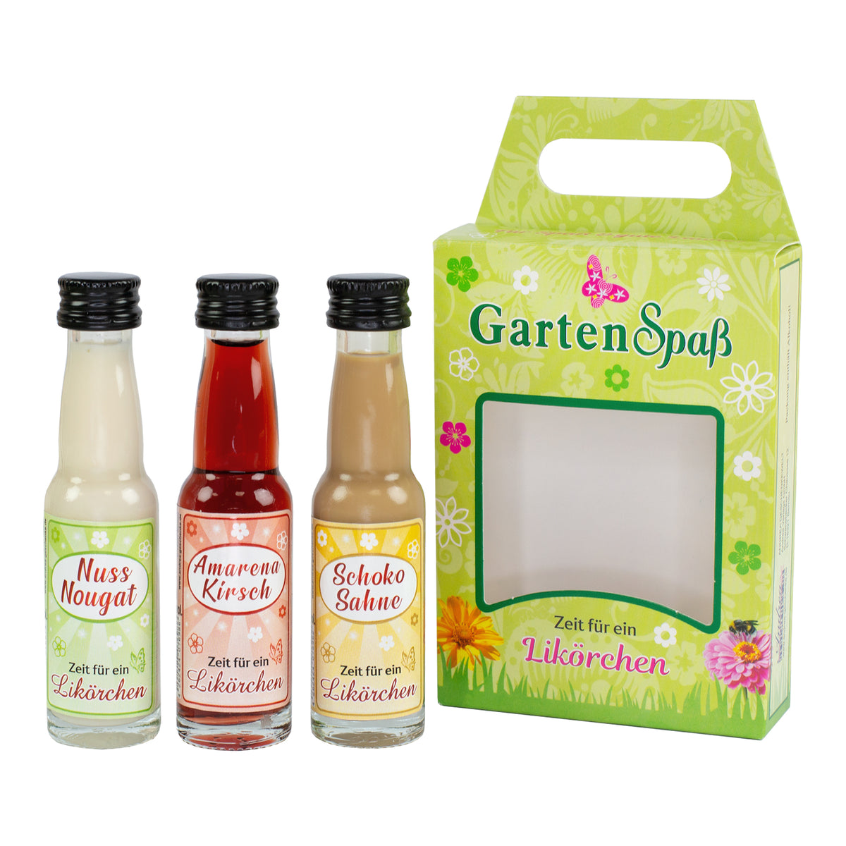 Mini Likör Set mit Nuss-Nougat, Amarena-Kirsch und Schoko-Sahne neben Geschenkverpackung freigestellt