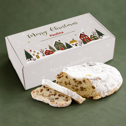 Weihnachtsstollen mit personalisierter Geschenkbox, Name Paulina und winterlichem Merry Christmas Motiv auf grünem Hintergrund