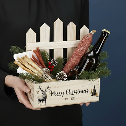 Geschenkkiste mit Zaun und Wunschtext zu Weihnachten