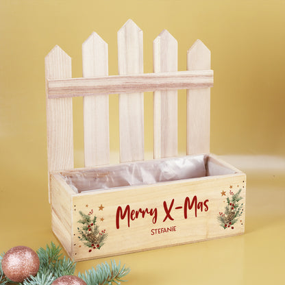 Personalisierbarer Pflanzkorb mit Zaun und roter Schrift Merry X-Mas als Weihnachtsdekoration