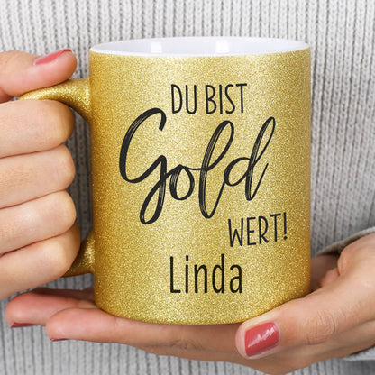 goldene Glitzertasse mit dem Namen bedruckt