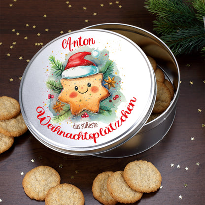 Geöffnete Keksdose mit Name Anton und Weihnachtsplätzchen Motiv auf dem Deckel