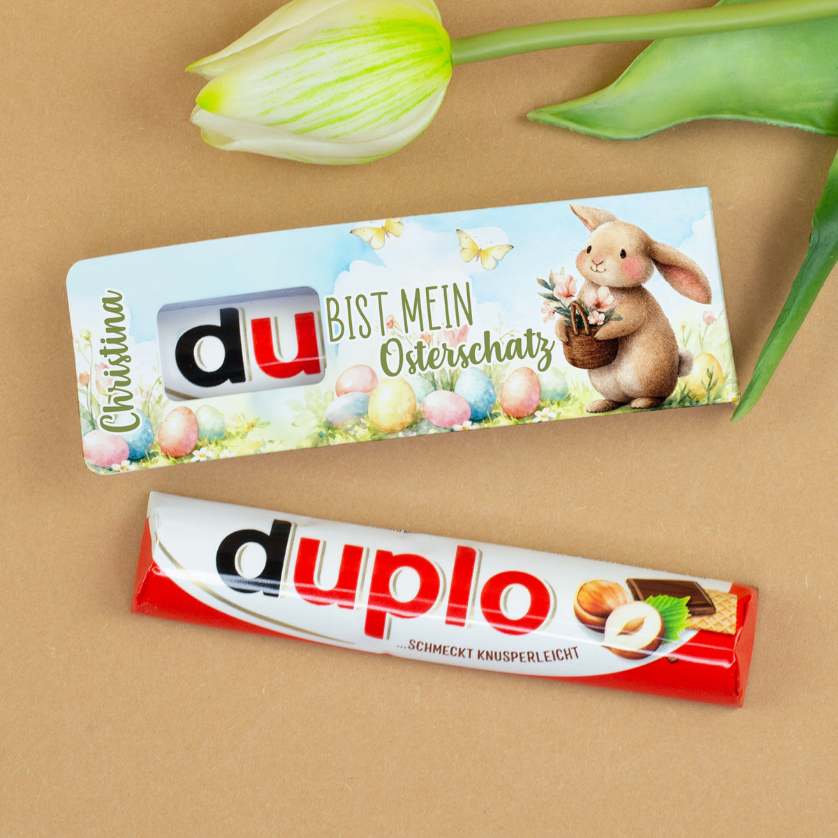 Personalisierter duplo Riegel zu Ostern mit Name, Hasenmotiv, bunten Ostereiern und Spruch Du bist mein Osterschatz