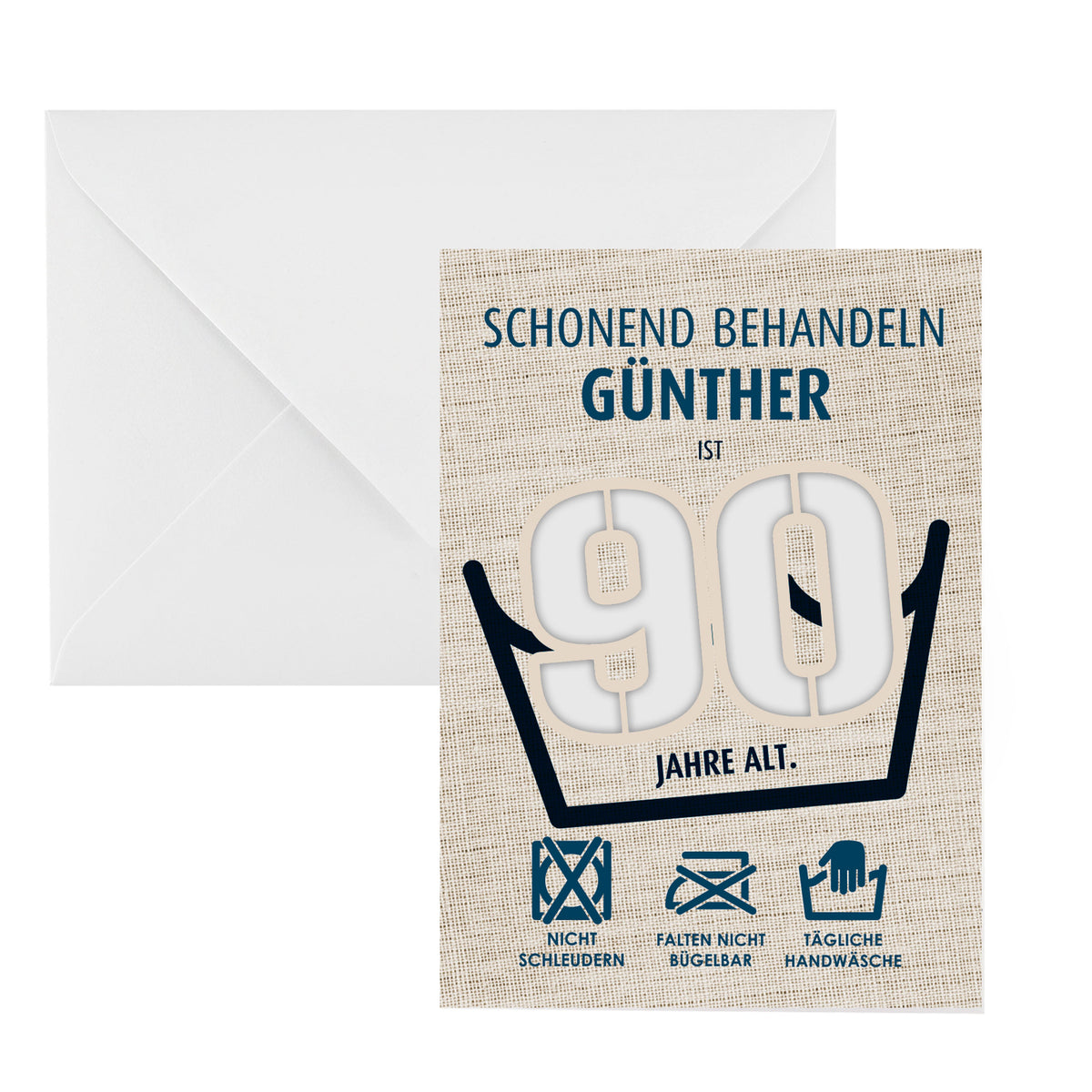 Klappkarte zum 90. Geburtstag mit dem Namen Günther und Waschanleitungssymbolen, daneben ein weißer Briefumschlag.