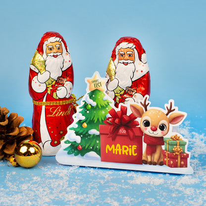 Personalisierte Rentier-Verpackung mit Lindt Weihnachtsmann und Name „Marie“ – Weihnachtsmotiv vor blauem Hintergrund