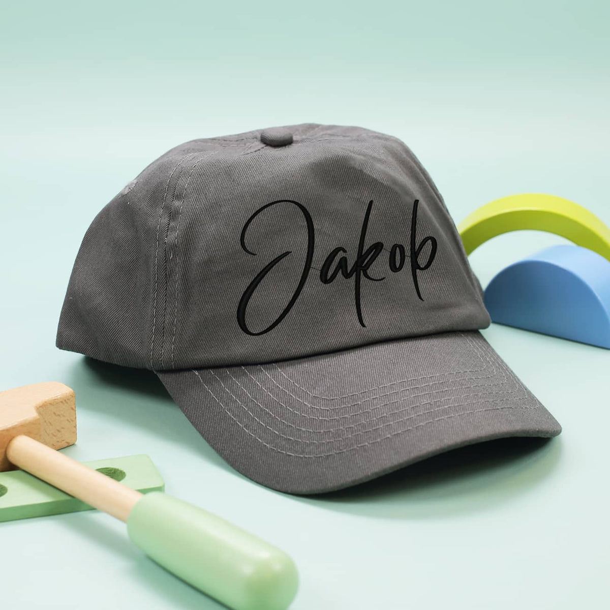 Basecap für Kinder mit Stick des Namens in schwarz
